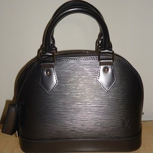 Louis Vuitton ALMA Leather Bag Authentic